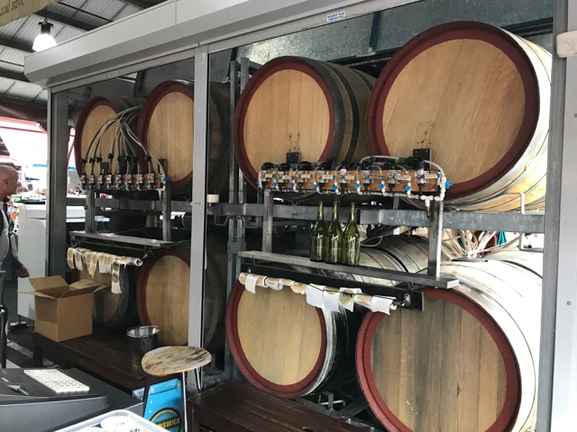 Refilling bottles on site from 16 different barrels of wine.