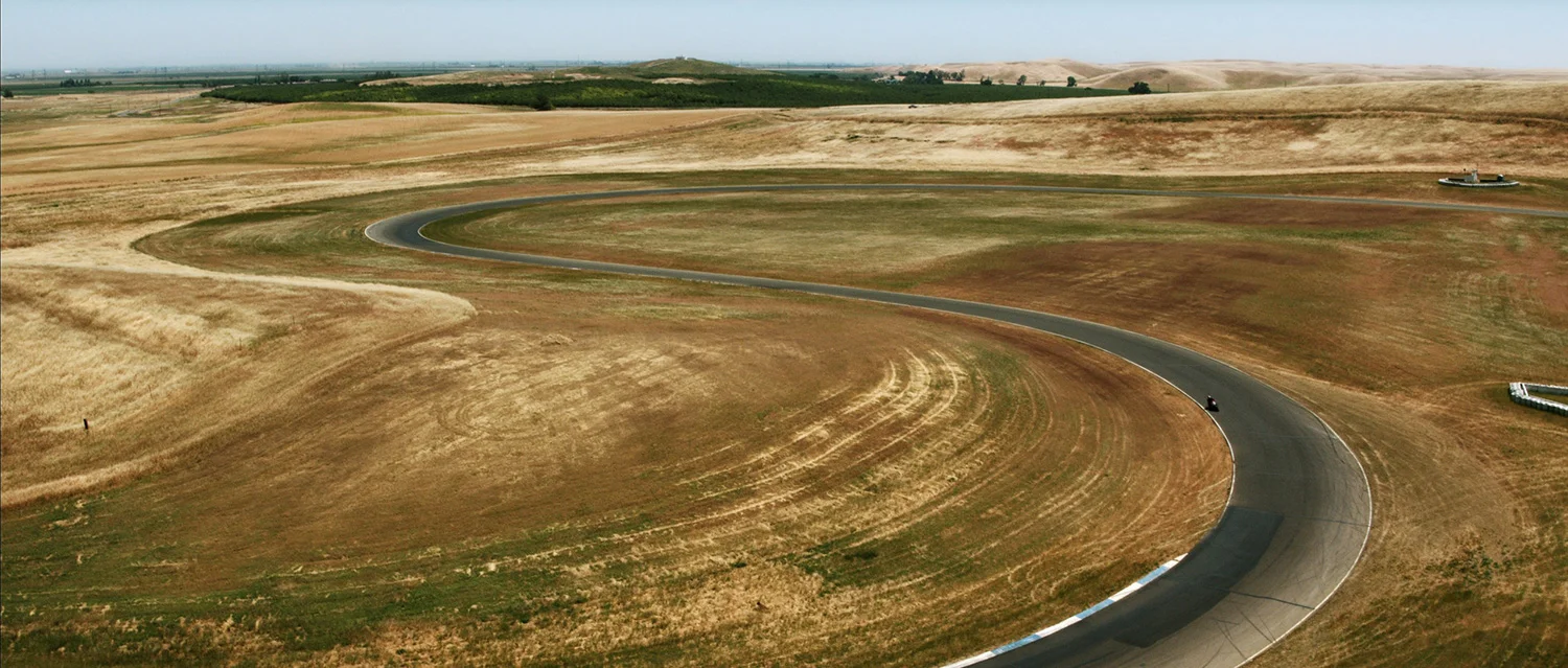 Drone perspective on Mardelle riding round the track