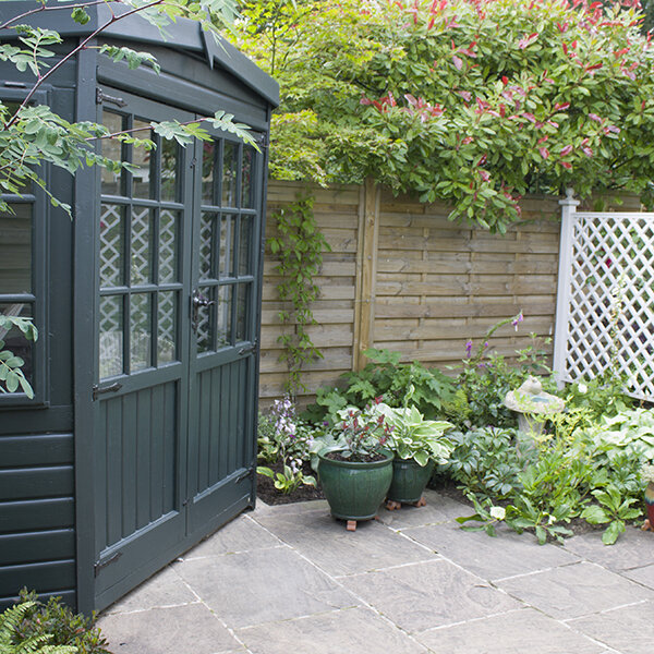 Small garden with shady summer house retreat