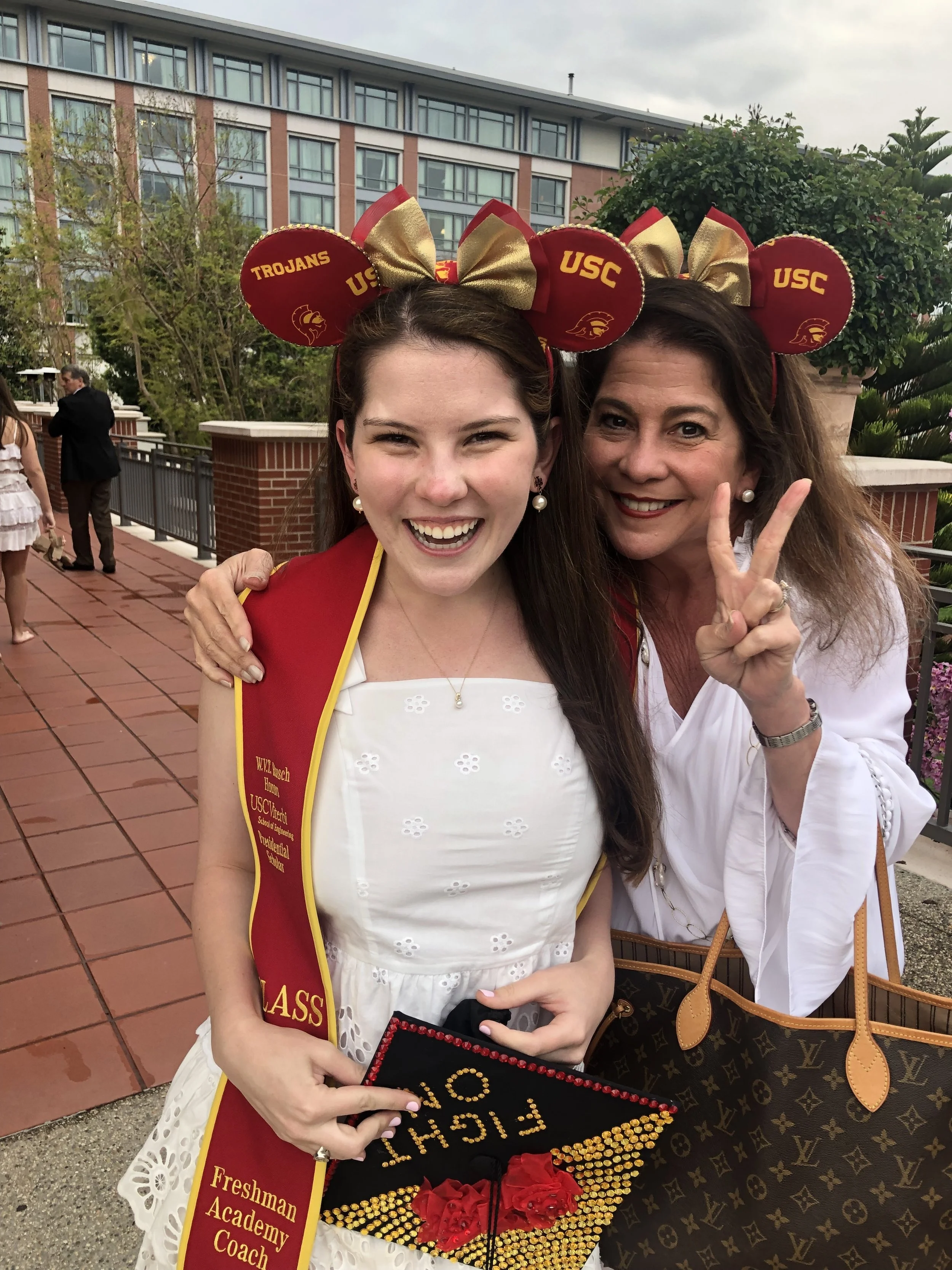 Natalie and her mom at graduation