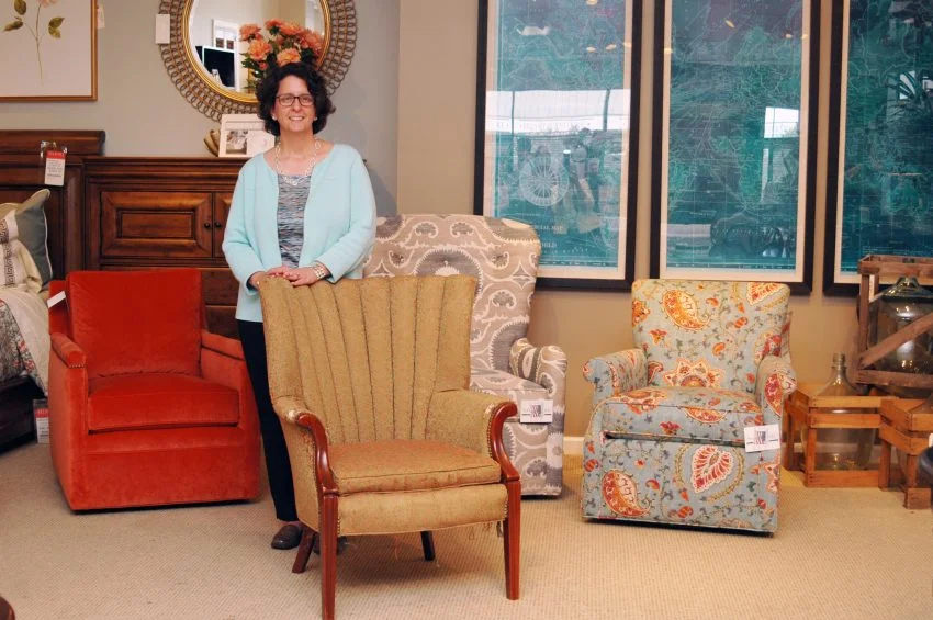 Sarah with her vintage chair at Belfort Furniture
