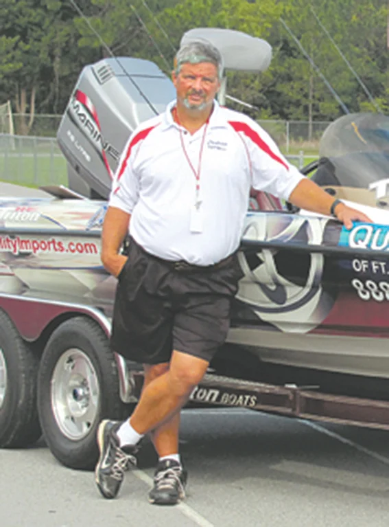 Ernie Martin with a boat from a local bass pro during the Outdoor Education class at Crestview High School.