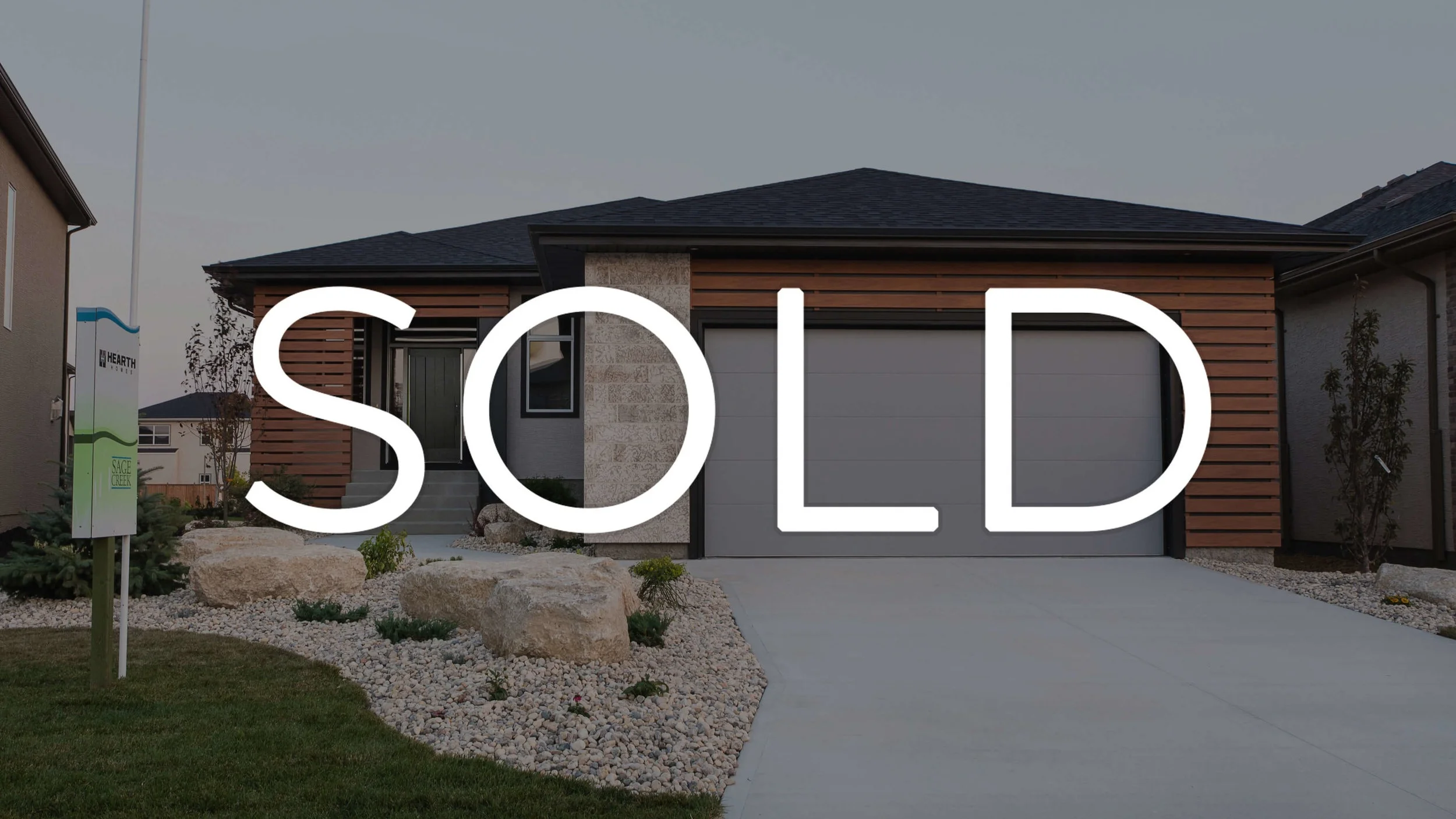 1815sqft_14+East+Plains_Exterior+Front_Bungalow_Sage+Creek_Sold.jpg