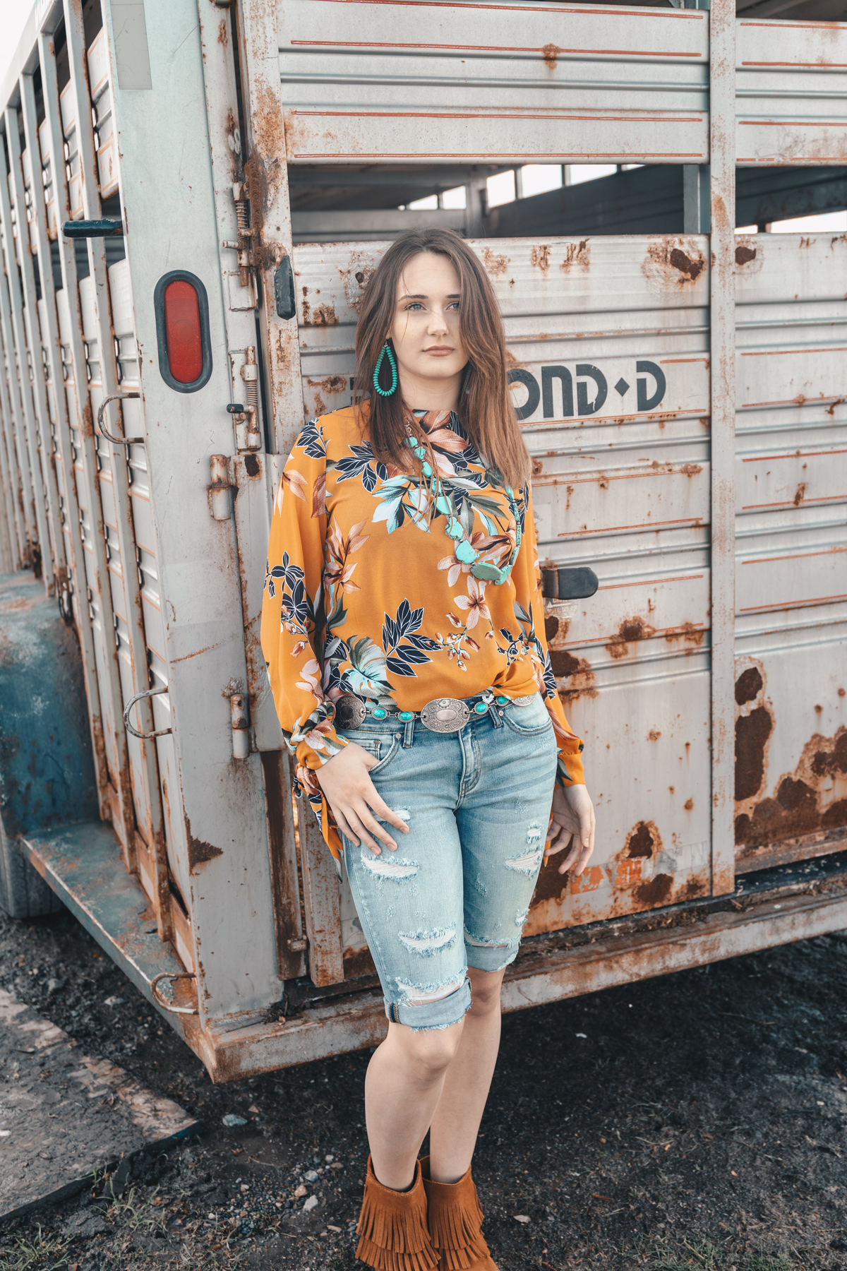 Be the queen of the rodeo in The Nashville Top from Wild Rag Bouqitue. This gorgeous, flowing top is boho through and through. #wildragboutique #bohowestern #western #cowgirlstyle #cowgirl #fashion