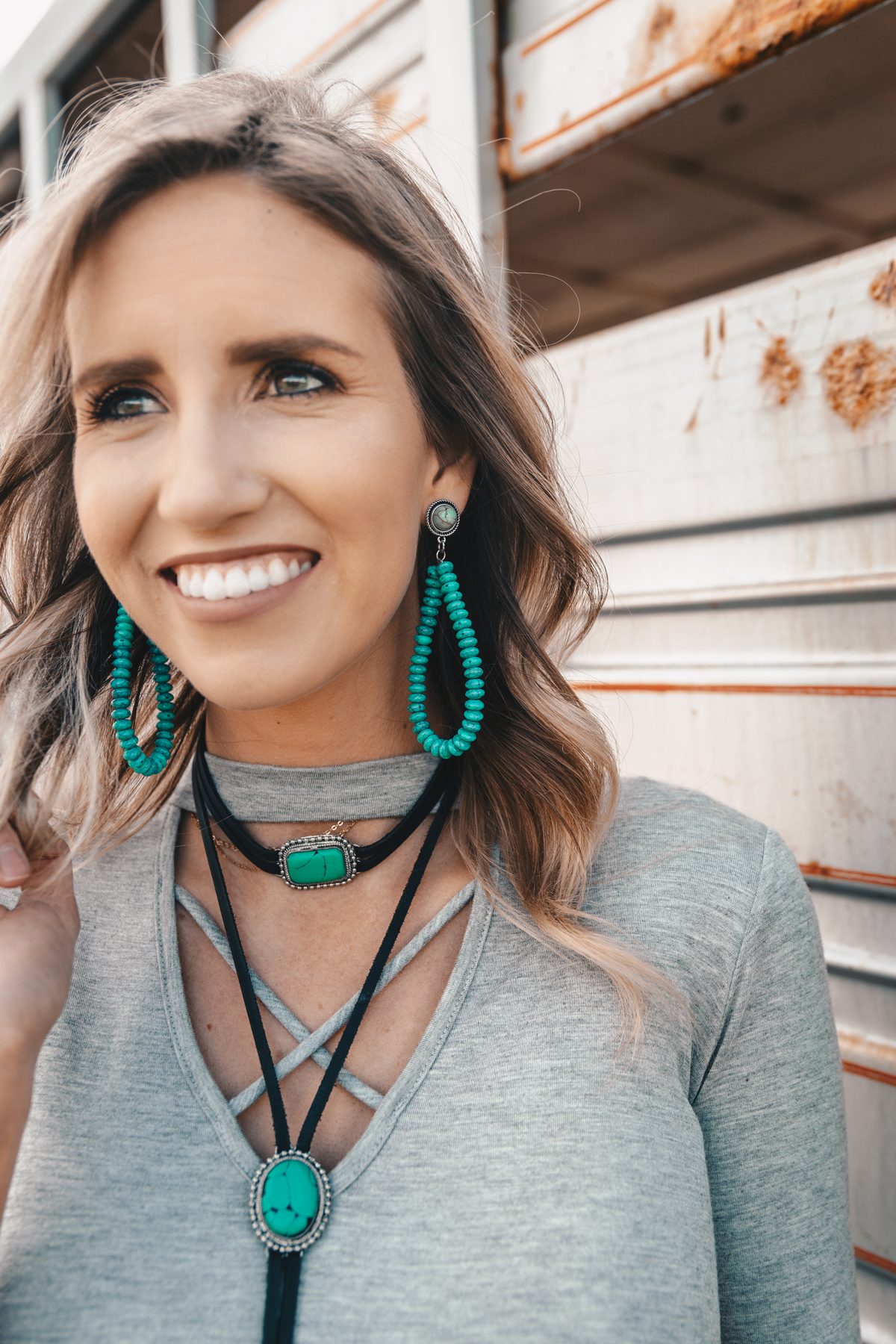 Let our best-selling dress join forces with our new line-up of turquoise jewelry for a winning look! #wildragboutique #westernboho #westernfashion #cowgirlstyle #onlineboutique #womensclothing