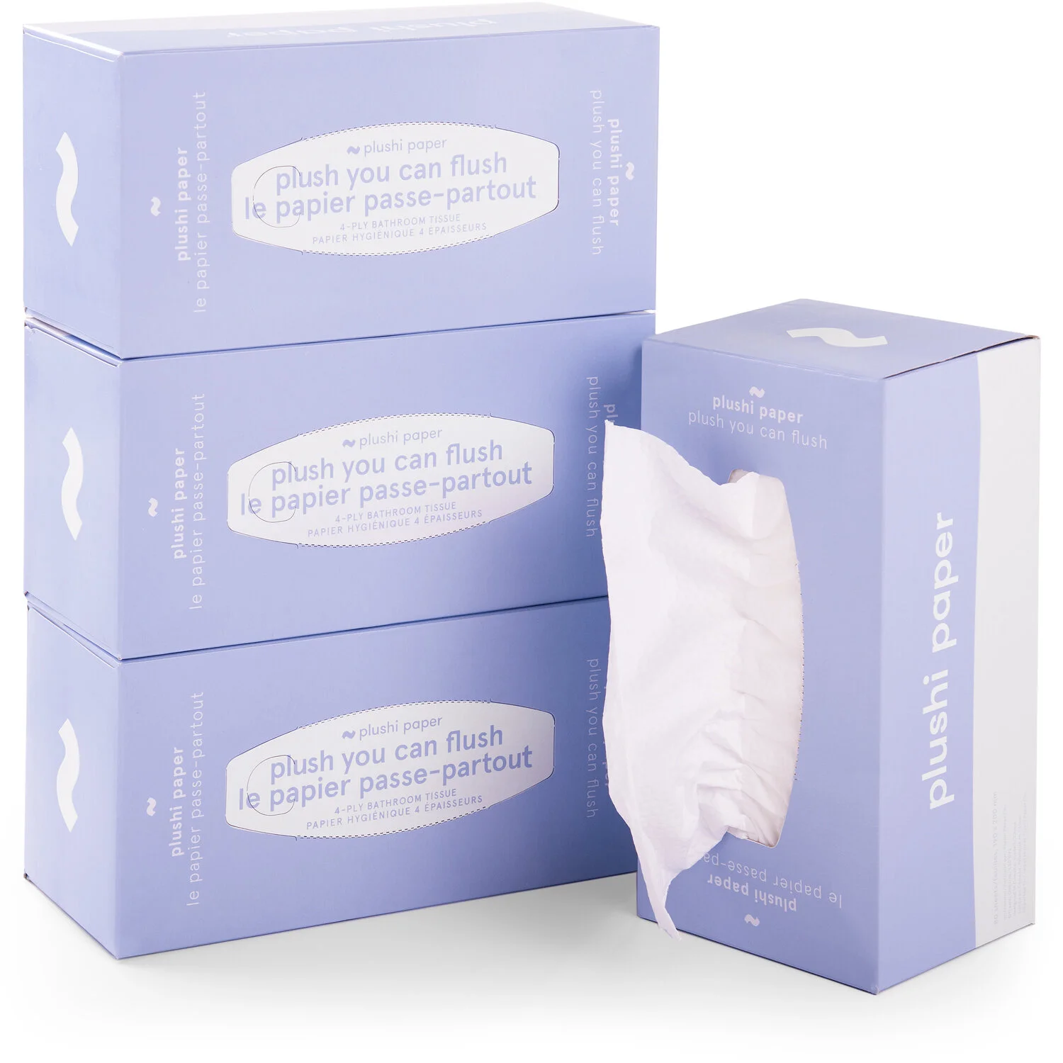 Three boxes of plush tissue paper, with one box open and a tissue pulled out.