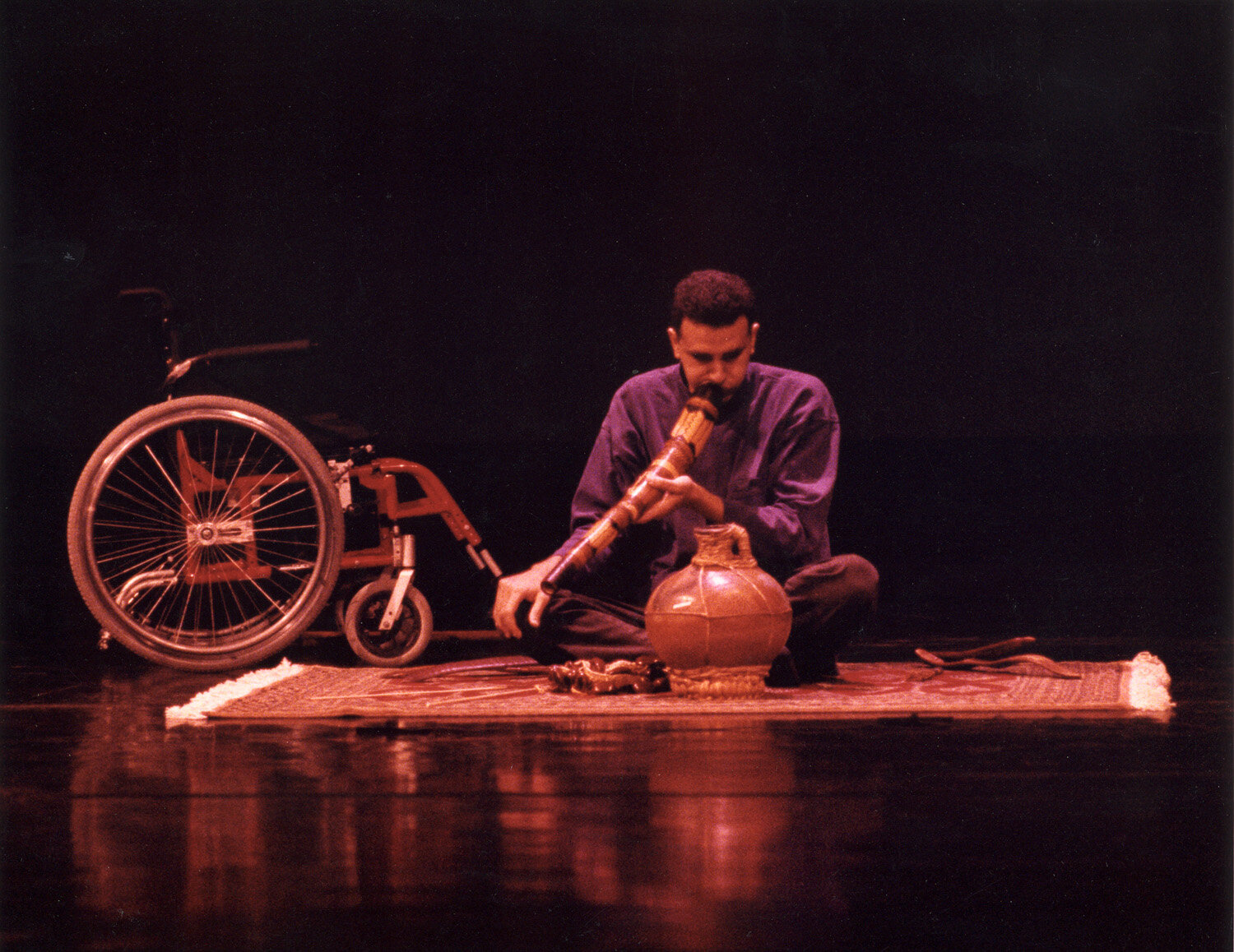 Photo of Ahmed Hassan preparing for a performance of Sanctum
