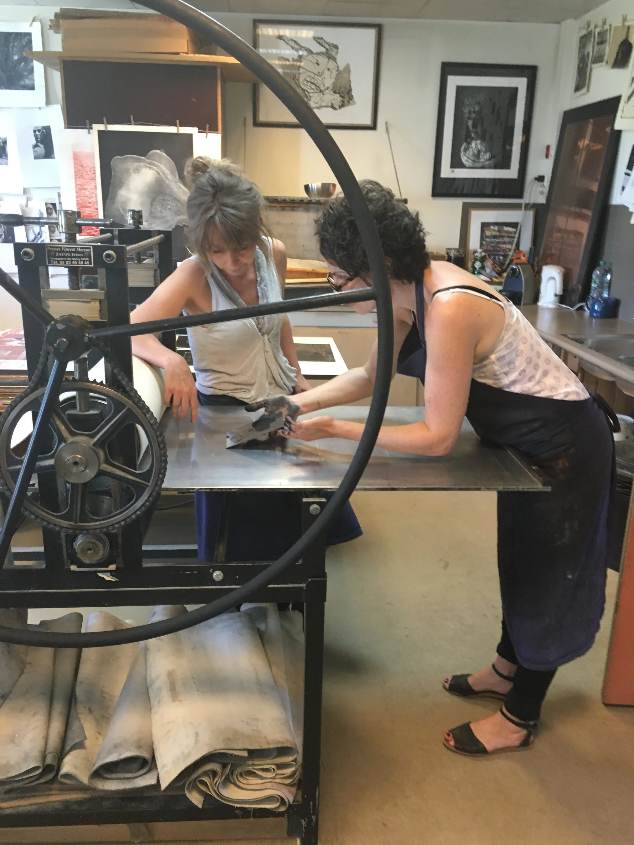 placing the plate on the press