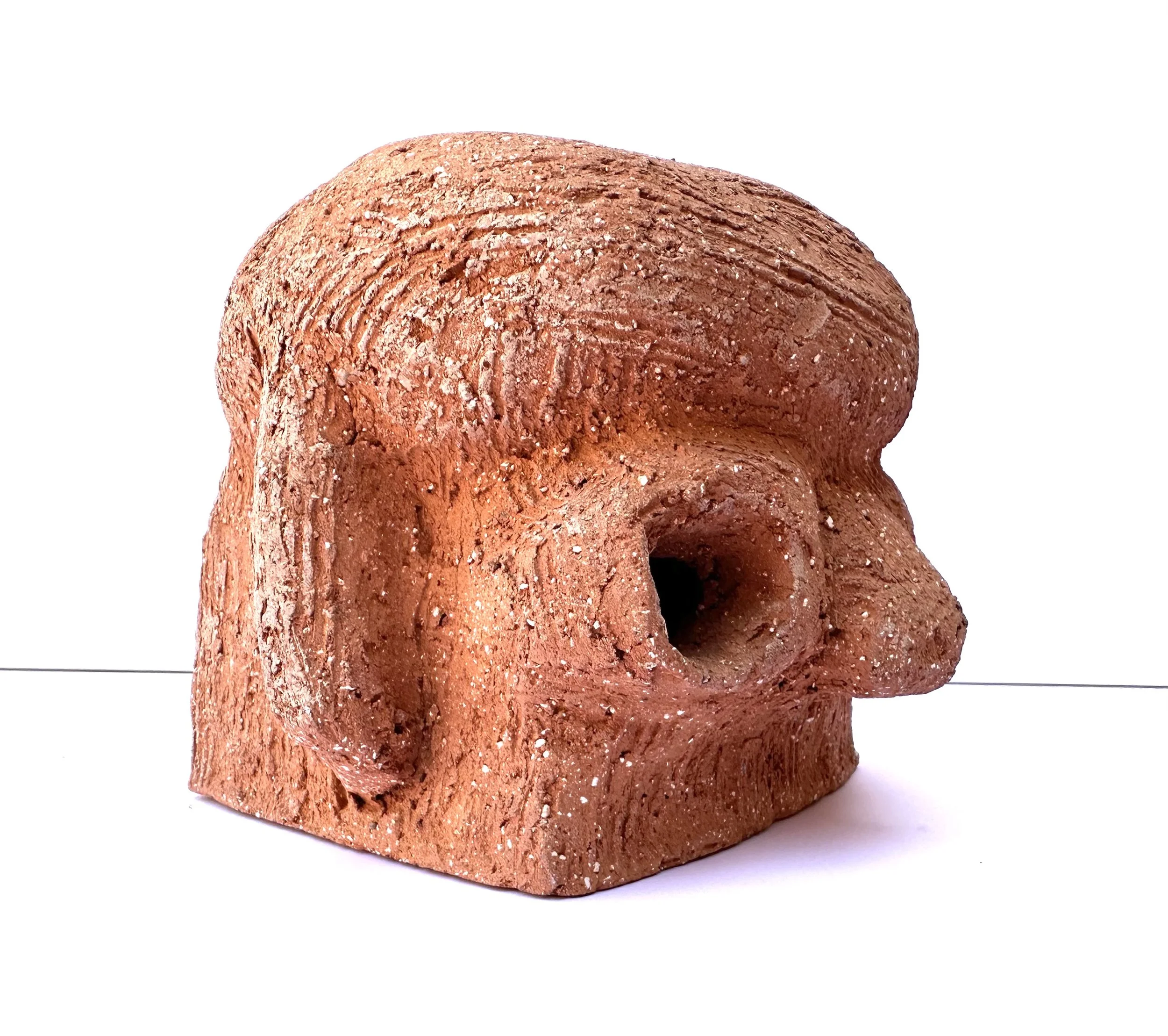 De frente (Head on)
Baked clay
5.3 in x 7.2 in x 6.2 in
2010