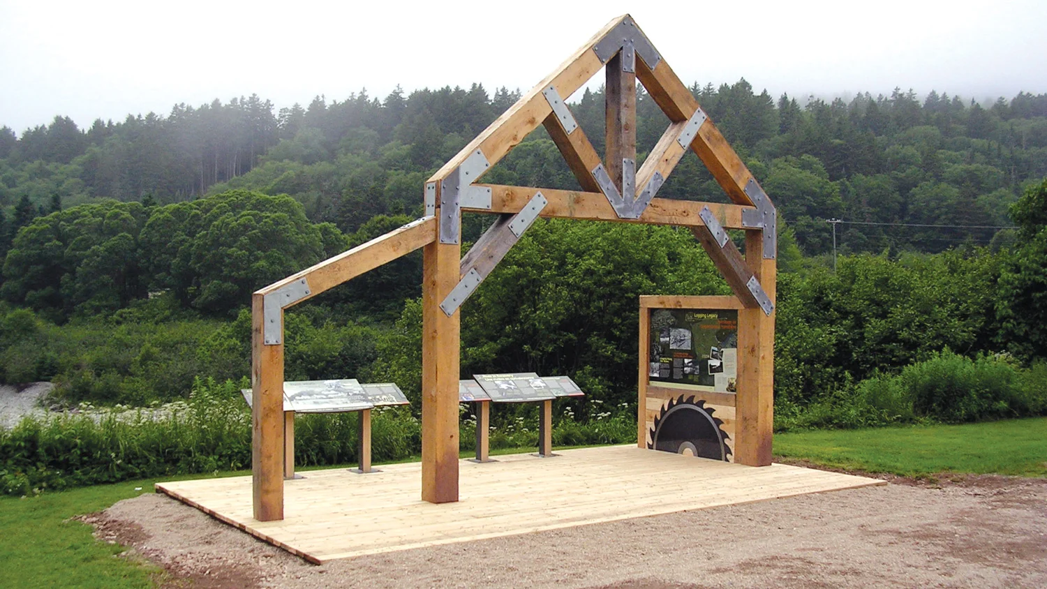 HISTORIC LOGGING HERITAGE Built structures and graphic panels at Point Wolfe evoke the park’s historic logging heritage.