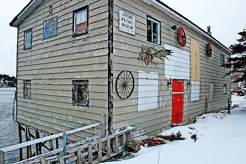 The Jerome Walsh Museum is a traditional coastal home, built on piles overhanging the shoreline.
