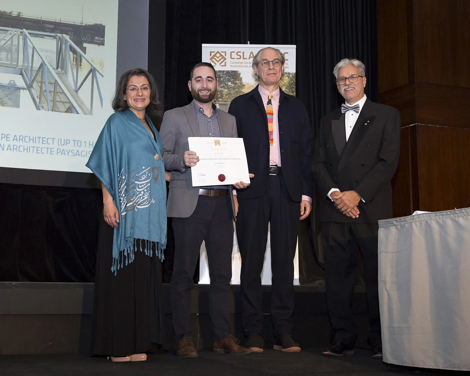 Nastaran Moradinejad - CSLA President, Devin Segal - Ekistics Plan + Design, Alan Tate - CSLA Awards Chair, Vincent Asselin - CSLA Past-President Photo: CSLA & OALA