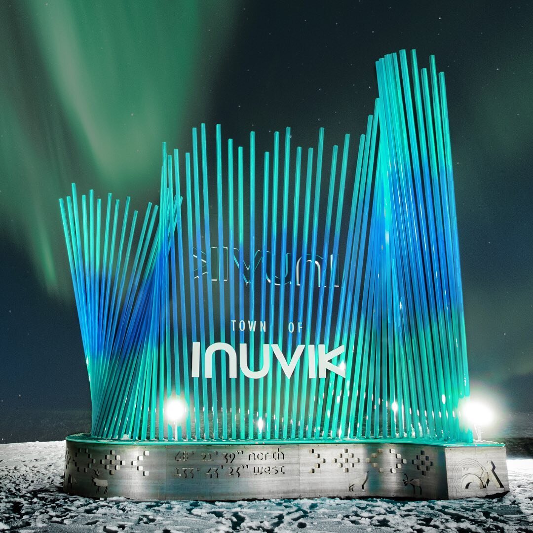 Welcome to Inuvik, Northwest Territories. The new gateway sign for the town of Inuvik references the aurora borealis and the winding curves of the Mackenzie river delta. An exercise in parametric design and fabrication, the sign&rsquo;s angled fins a