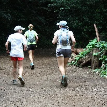 Coming into Paradise Park. Sarah and Andrea and my pacer, Sue (in front) were so encouraging! Photo by Andrea Stout.