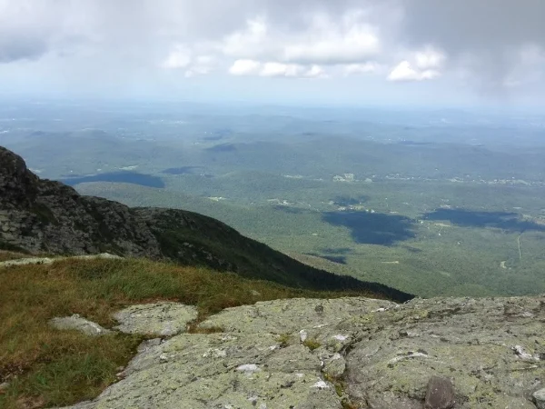 A bit south of the summit (heading south toward the Mt. Mansfield Visitors' Center on the Long Trail), looking west. Most of the morning these clouds came and went, but a bit later in the hike they would settle in and become more threatening.