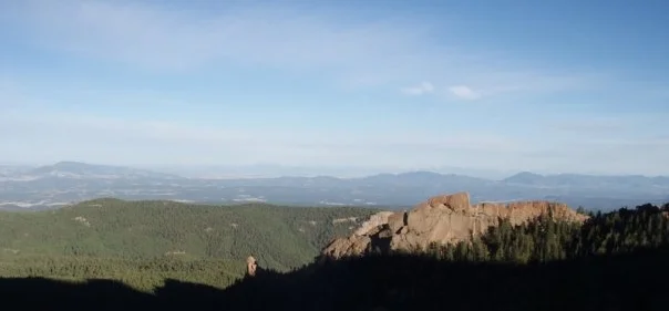 The Crags looked massive from below, but now shrink and disappear below as the sun rises and our view expands on this steeply-climbing trail.