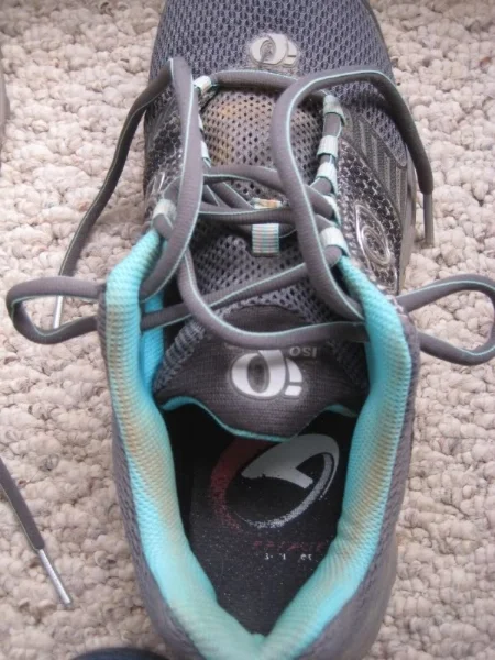 You'll end up with an image something like this, with two loops sticking out each side of the top of the shoe.