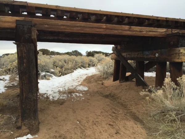The trail dips under the railroad tracks.