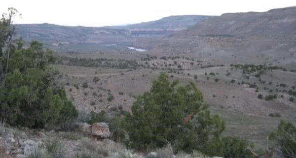 ...and here, looking northwest, our first glimpse of the Colorado River, as the climbing continues.