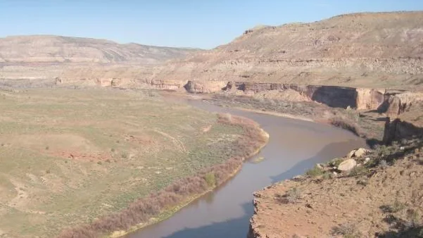 From time to time a breeze would rise up from the river, cooling the air.
