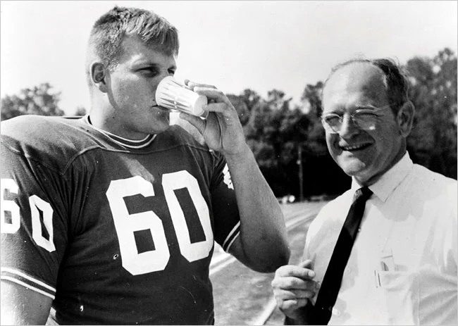 Chip Hinton trying J. Robert Cade's invention in 1965. Photo courtesy University of Florida, via Agence France-Presse — Getty Images.