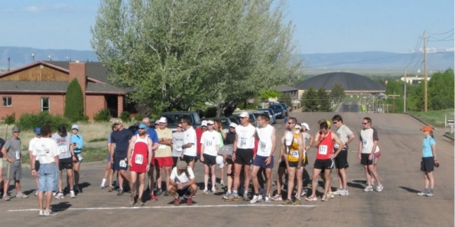 That's me in the turquoise top to the far left of the photo, starting toward the back. Don't want to get run over by Nick Clark or trip up Michael Huntington!