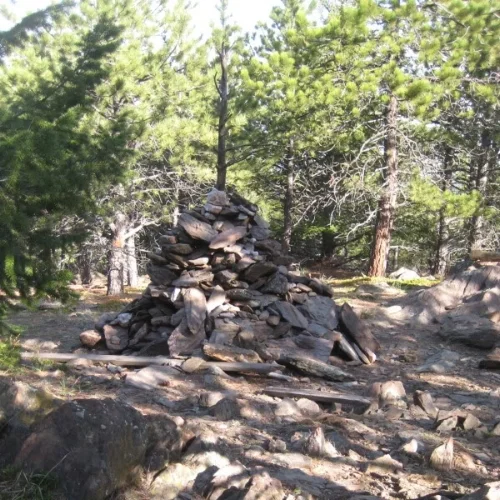No views from the summit, but the cairn is pretty huge.