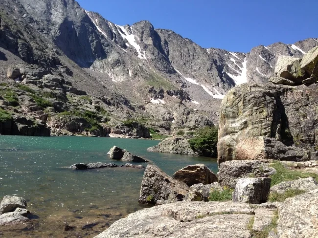 Lake of Glass, with steep cliffs all around.