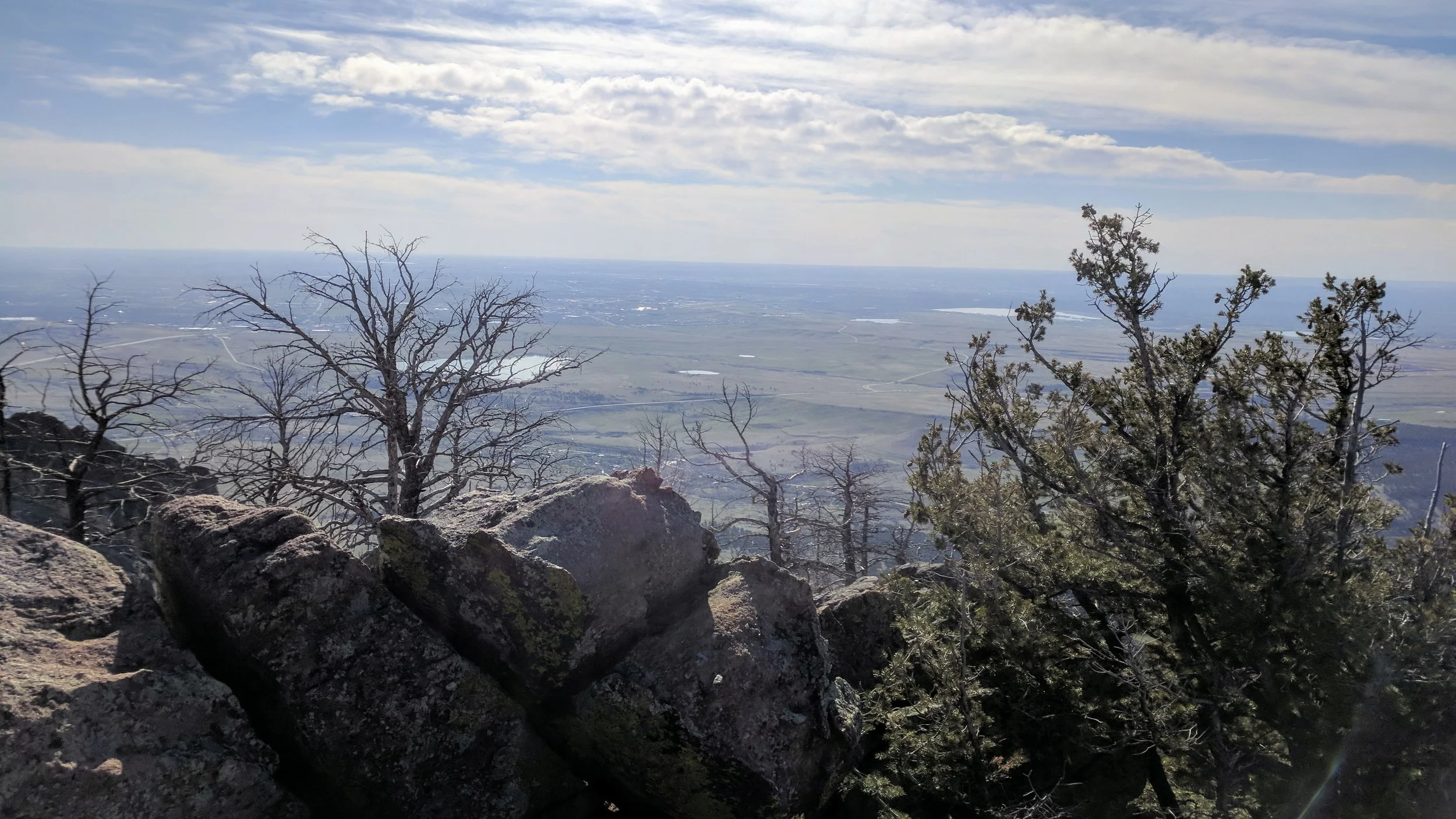 After a rocky scramble up the side of South Boulder Peak, tag the summit (8,549' -- the tallest of the Traverse) and enjoy the view over Boulder to the east...