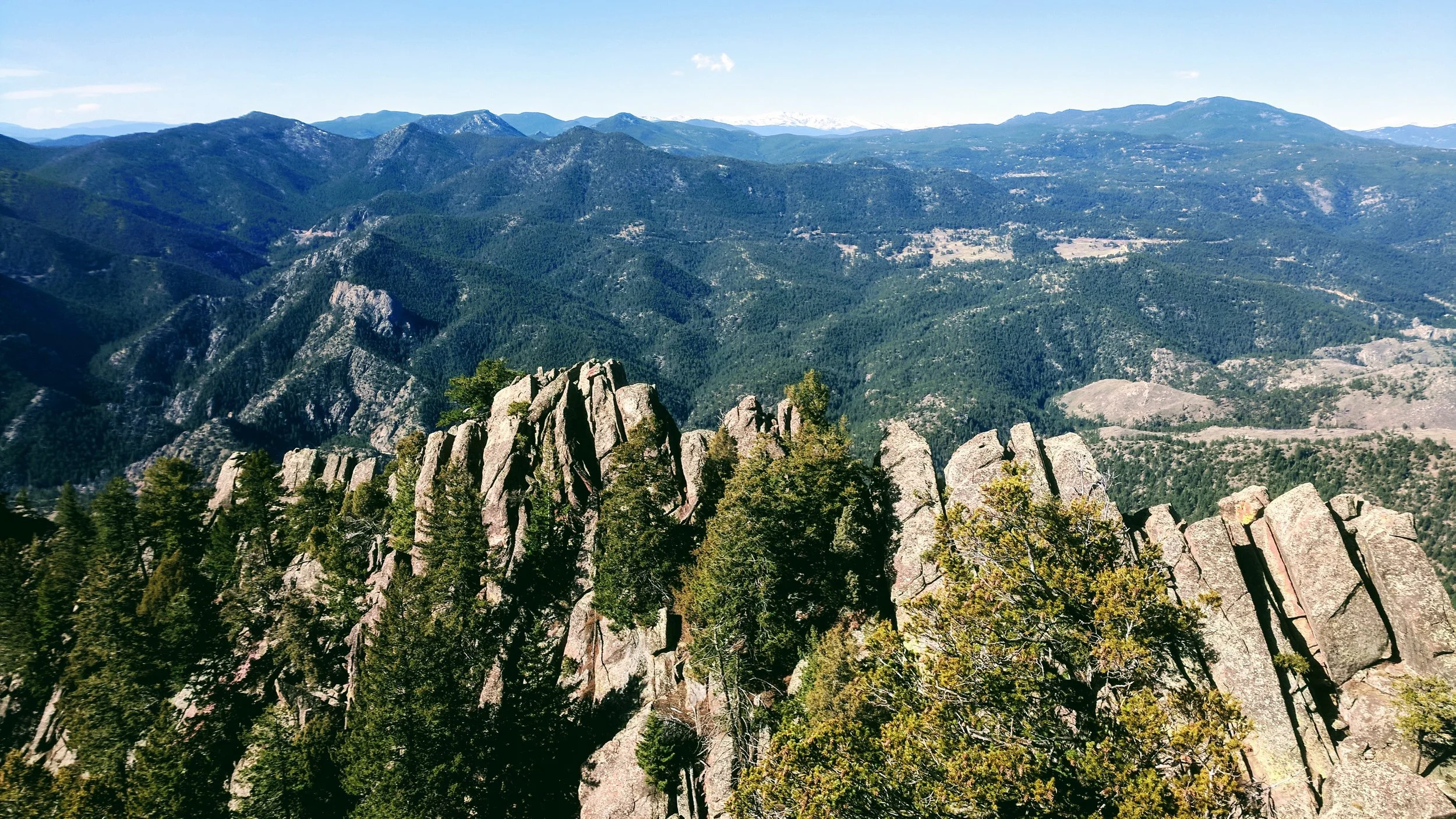The view south is awesome too. I'm not particularly bothered by heights, but the drop-off from the summit is pretty extreme. Step carefully!