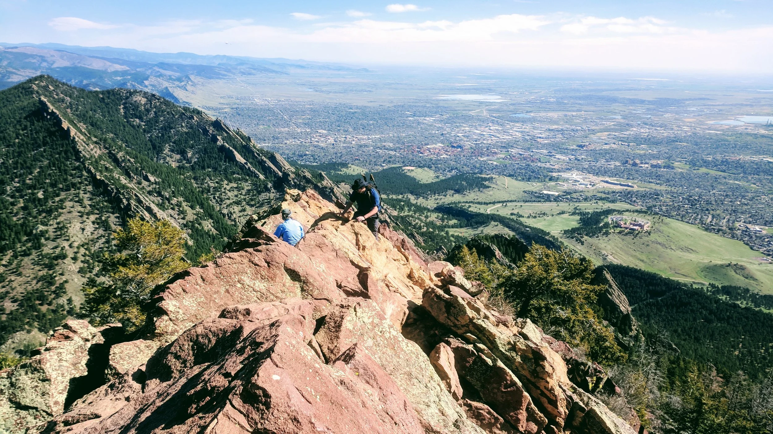 The Bear Peak summit (8,459') looking north. The Flatirons (seen from the side in this photo) and the rest of the Traverse all lie ahead!