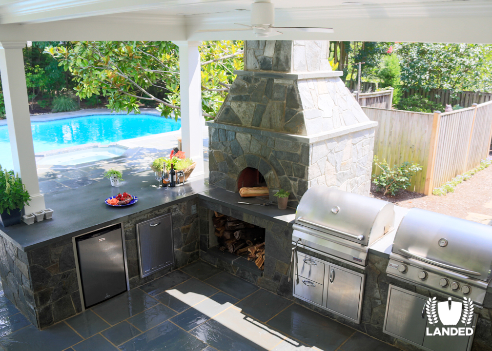 Custom Outdoor Kitchen Design with Outdoor Grills and Woodfire Pizza Oven | Landed 