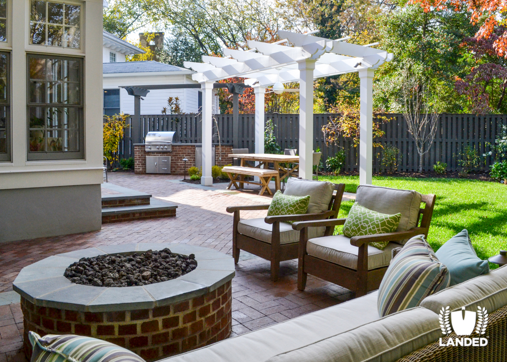 Custom Outdoor Living Space with Fire Pit, Brick Patio, and Custom Outdoor Kitchen | Landed