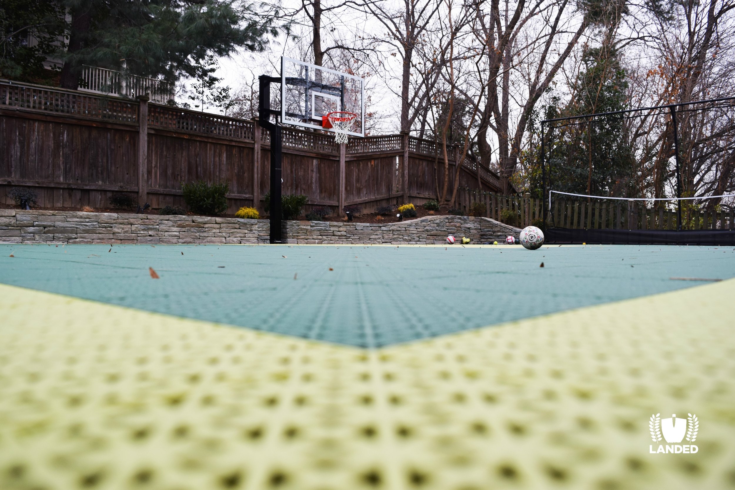 Custom Designed Sports Court with Basketball Hoop, Rebounder Net | Landed – Landscape Designers