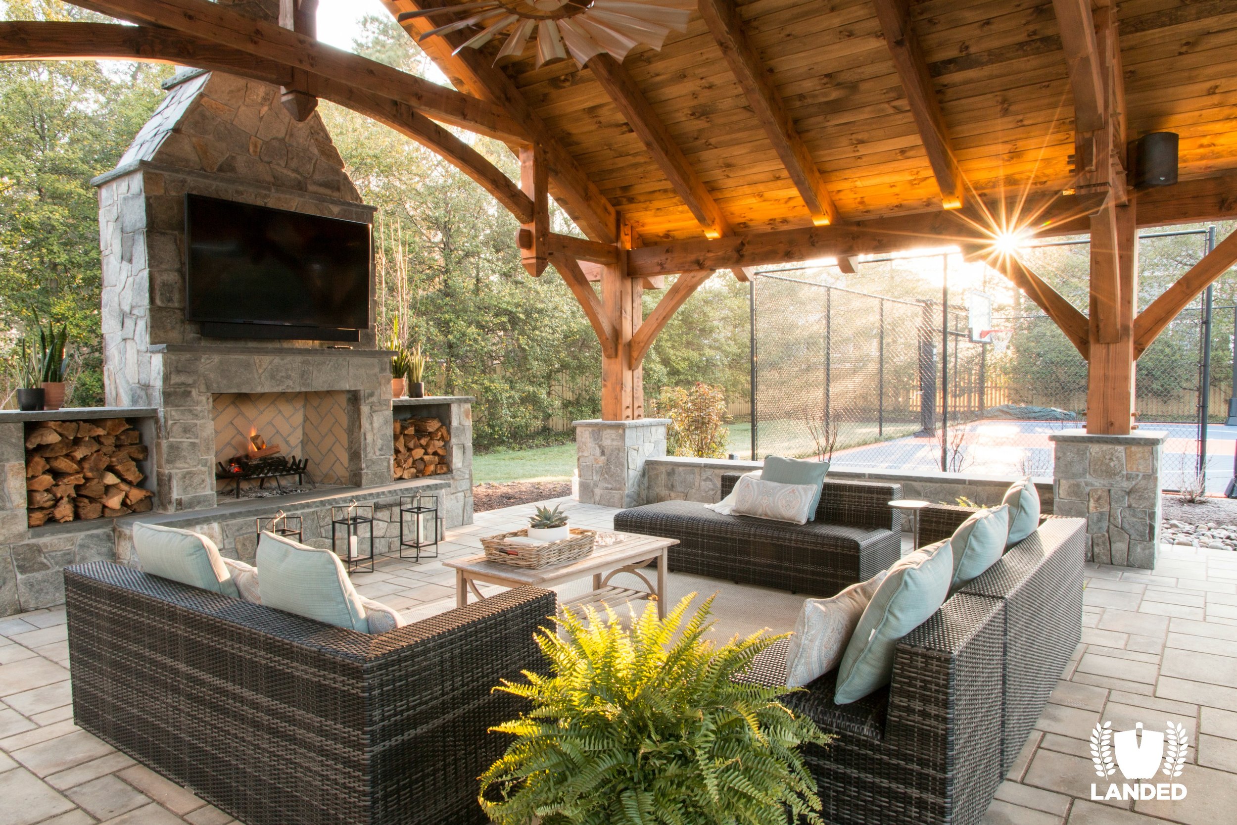  Timber frame outdoor patio, fireplace, dining bar, kitchen and fire pit. Techo Bloc pavers. 