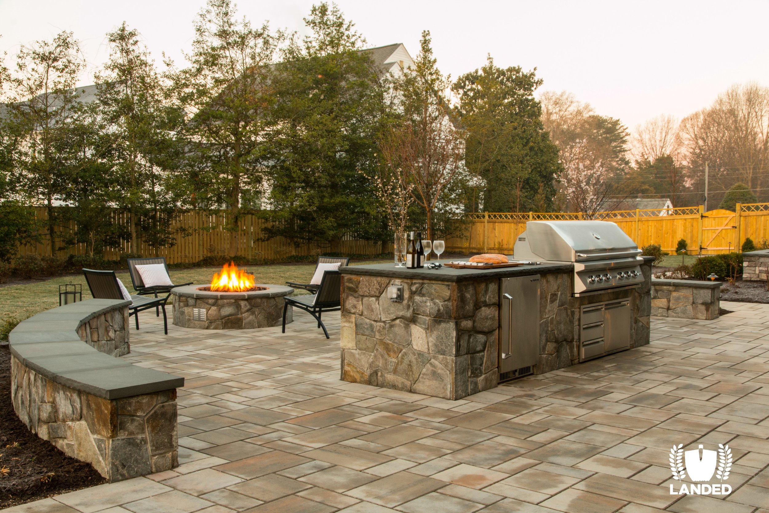  Timber frame outdoor patio, fireplace, dining bar, kitchen and fire pit. Techo Bloc pavers. 