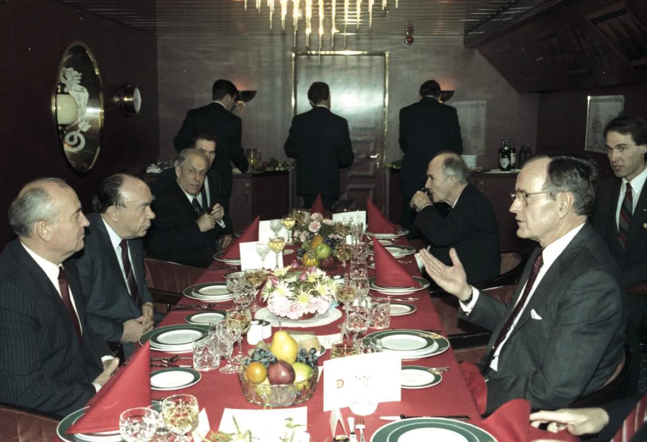 President Bush and Chairman Gorbachev at the Malta Summit (December 2–3, 1989) dinner with their staffs. This summit has been called the most important summit conference since Potsdam in 1945.  It came only weeks after the fall of the iron curt…