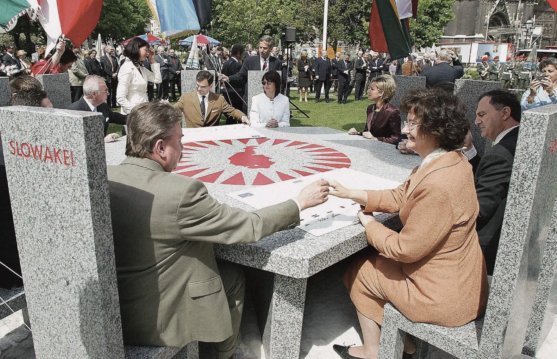Ambassadors of the ten new EU member states unveil the ‘Partner of all nations’ table, a memorial with ten granite stone chairs, at the Sigmund Freud park in Vienna, in front of Votivkirche on Friday, 30 April 2004, the day before the official acces…