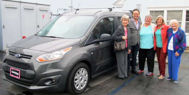 Members of Women's Fellowship with Nick Rasmussen of Family Promise of the South Bay and the commuter van that they purchased for Family Promise in 2017. The van replaced a older van in need of repair and allows students and parents to get to school and work safely and on time. 