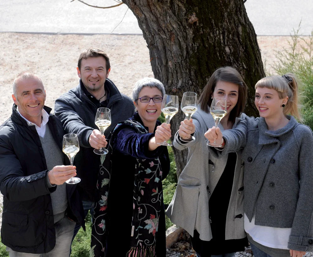 Antonio (left) and Roberta Giuriati Steelier (center) with their team, courtesy Maso Martis.