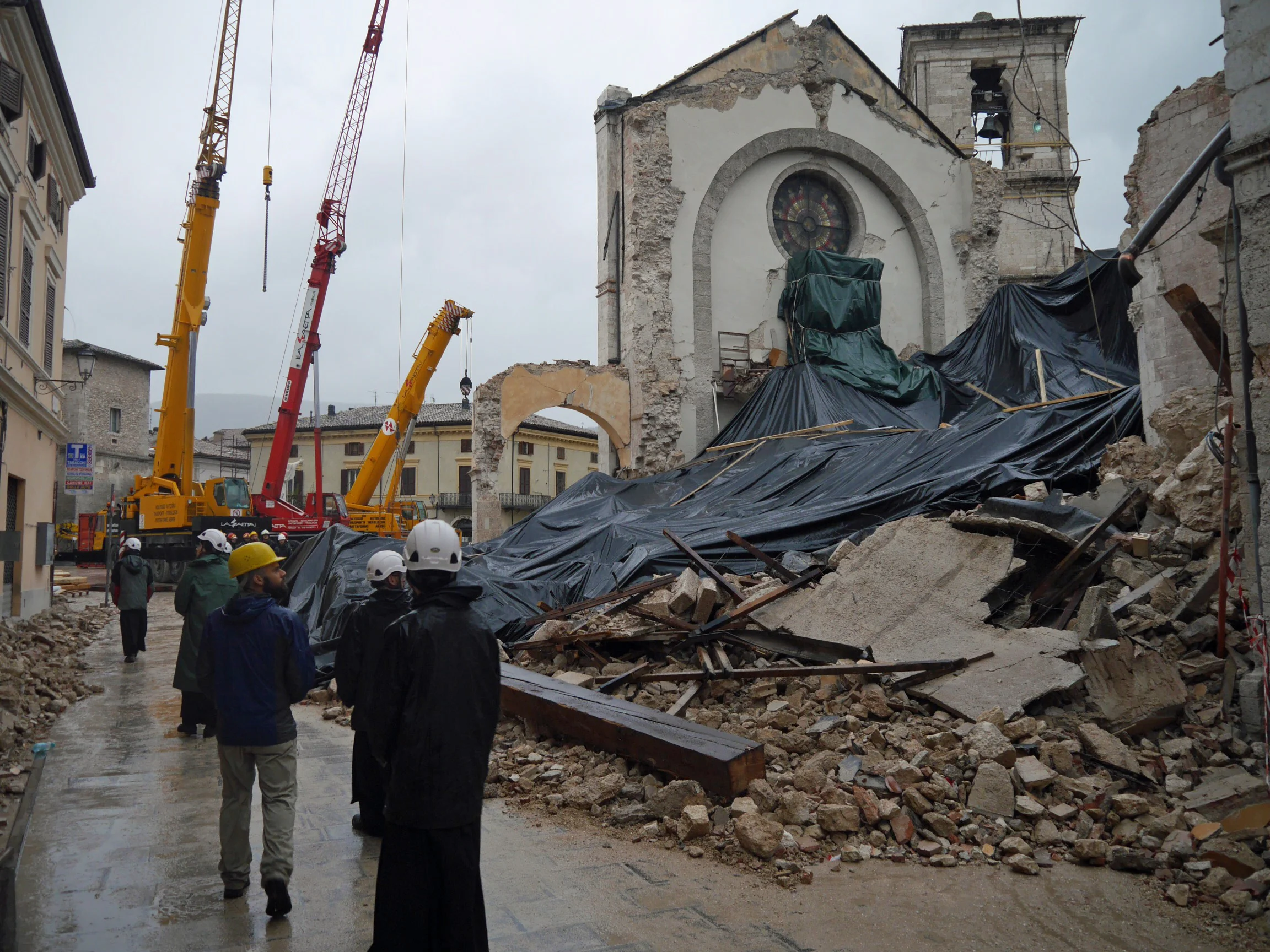 Surveying the damage after the 6.6-magnitude earthquake.