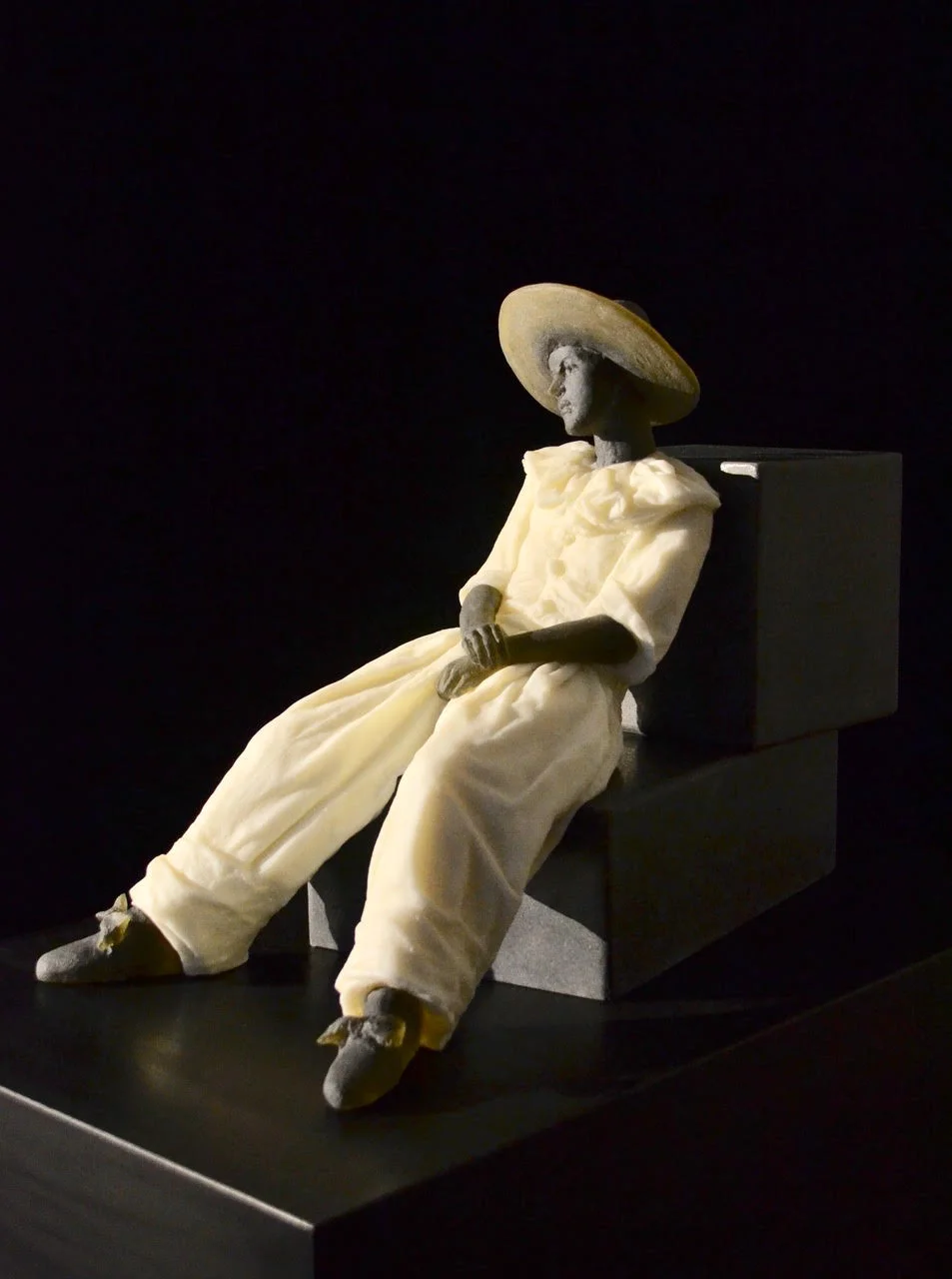 Nicolas Africano (American, born 1948) Garbo Figure (reclining figure on two cubes) , 2018 Signed Cast glass 18 x 25 x 12 inches
