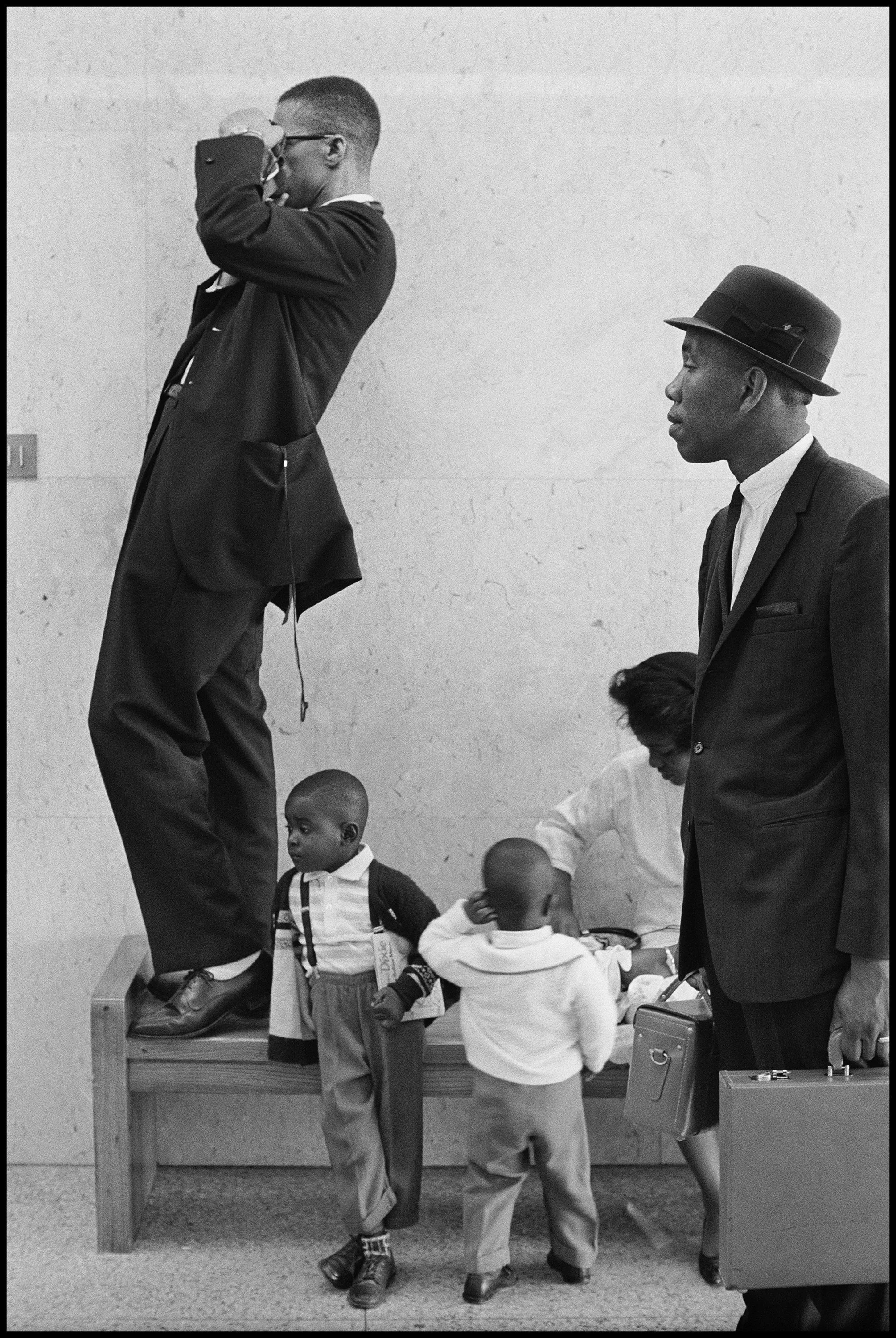  Gordon Parks (American, 1912-2006)   Untitled (Malcolm X taking a photo) , 1963 Gordon Parks Foundation Stamp on verso Gelatin silver print 40 x 30 inches Edition of 7 