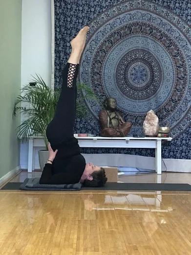 Salamba Sarvangasana Once secure lift legs towards the ceiling. Hold shoulderstand as long as feels comfortable. (Do not turn head) To release: remove hands, gently roll down and hug knees into the chest.