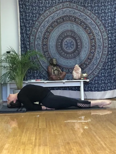 Matsyasana Lie on your back with knees bent. Raise the buttocks and slide your hands, palm facing down, under the body. Release back down on hands and straighten the legs. Inhale coming onto the elbows and lift the chest, the back of the head stays in contact with the floor. Take 5-6 breaths opening and closing your mouth to stretch the throat. Release and hug knees to the chest.
