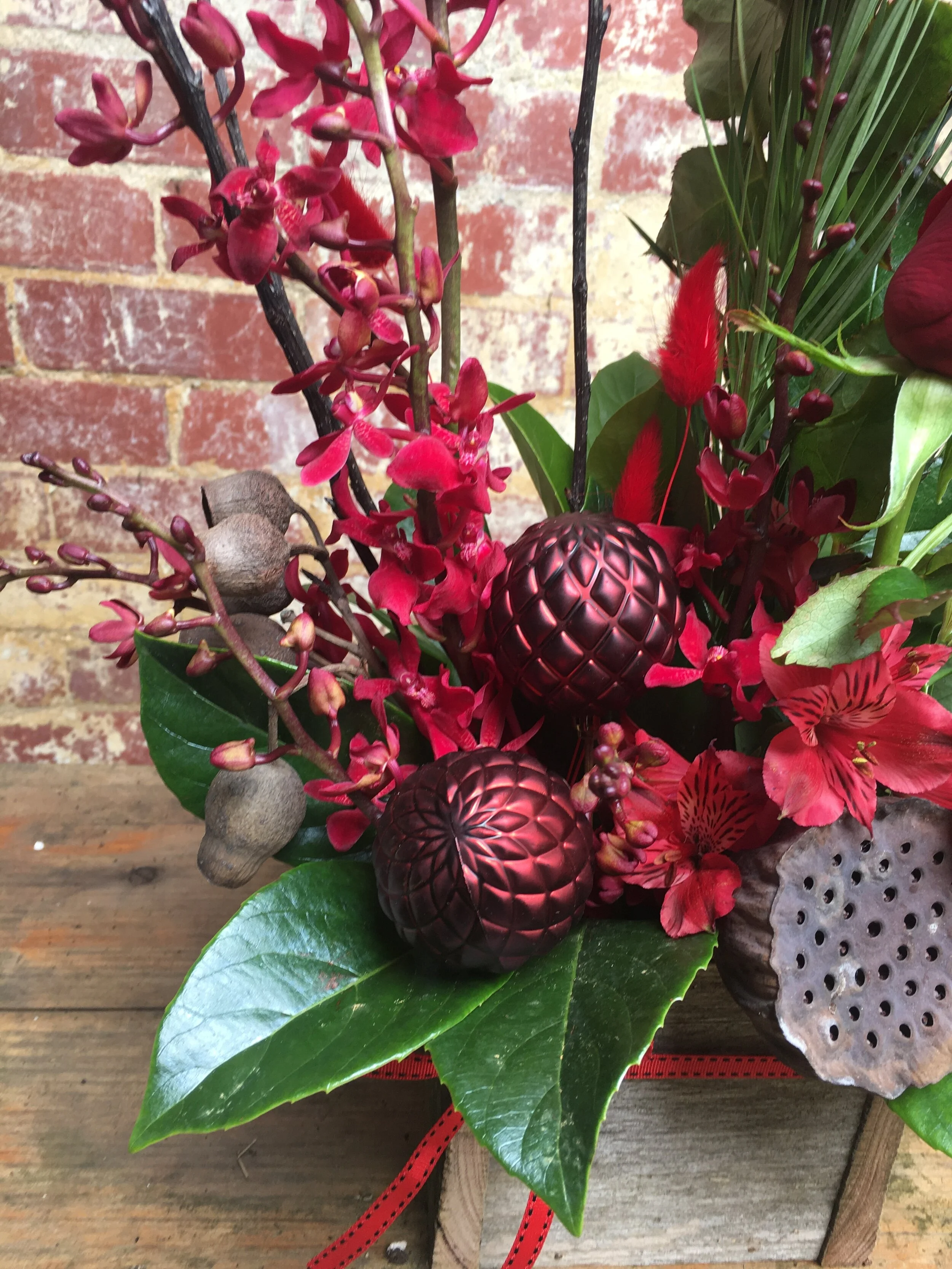 Christmas arrangement in a rustic box close-up.jpg