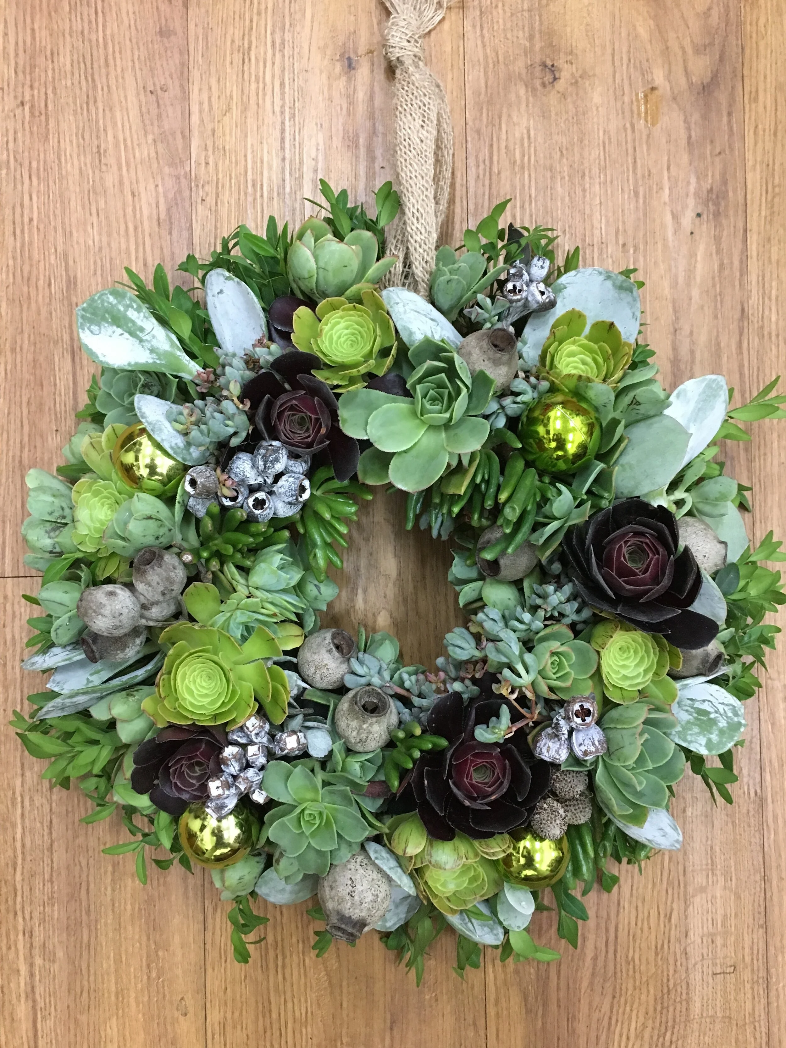 Succulent wreath with hessian strap.jpg