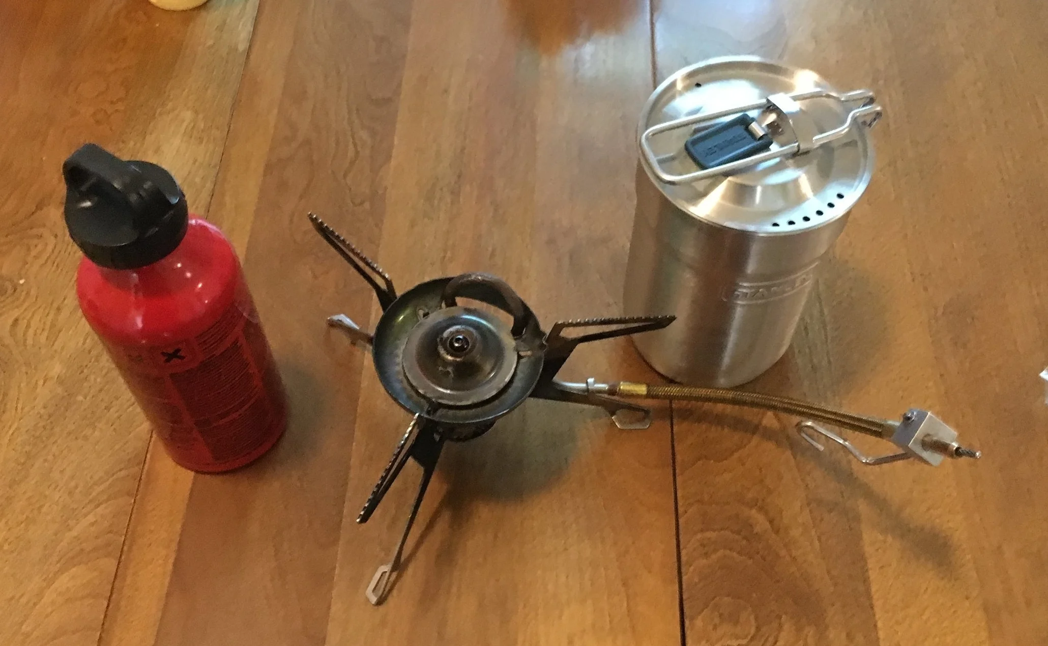 MSR WhisperLite and water container