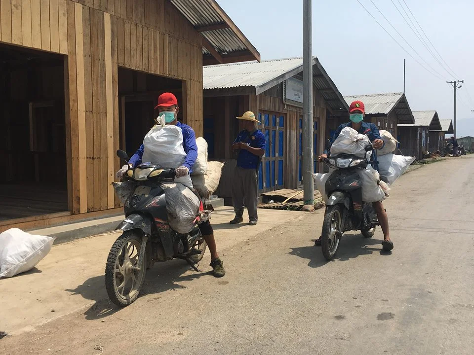 Carrying Trash to the Dump Site 