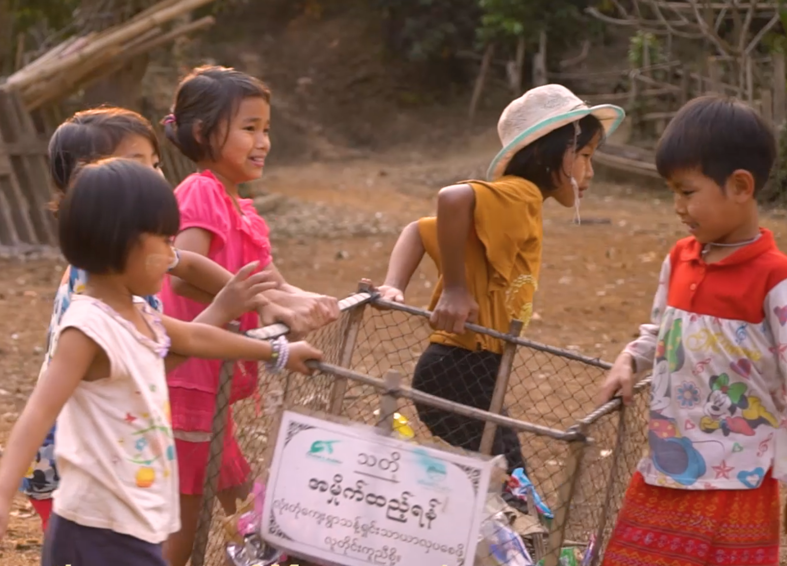 Children helping with the plastic awareness campaign